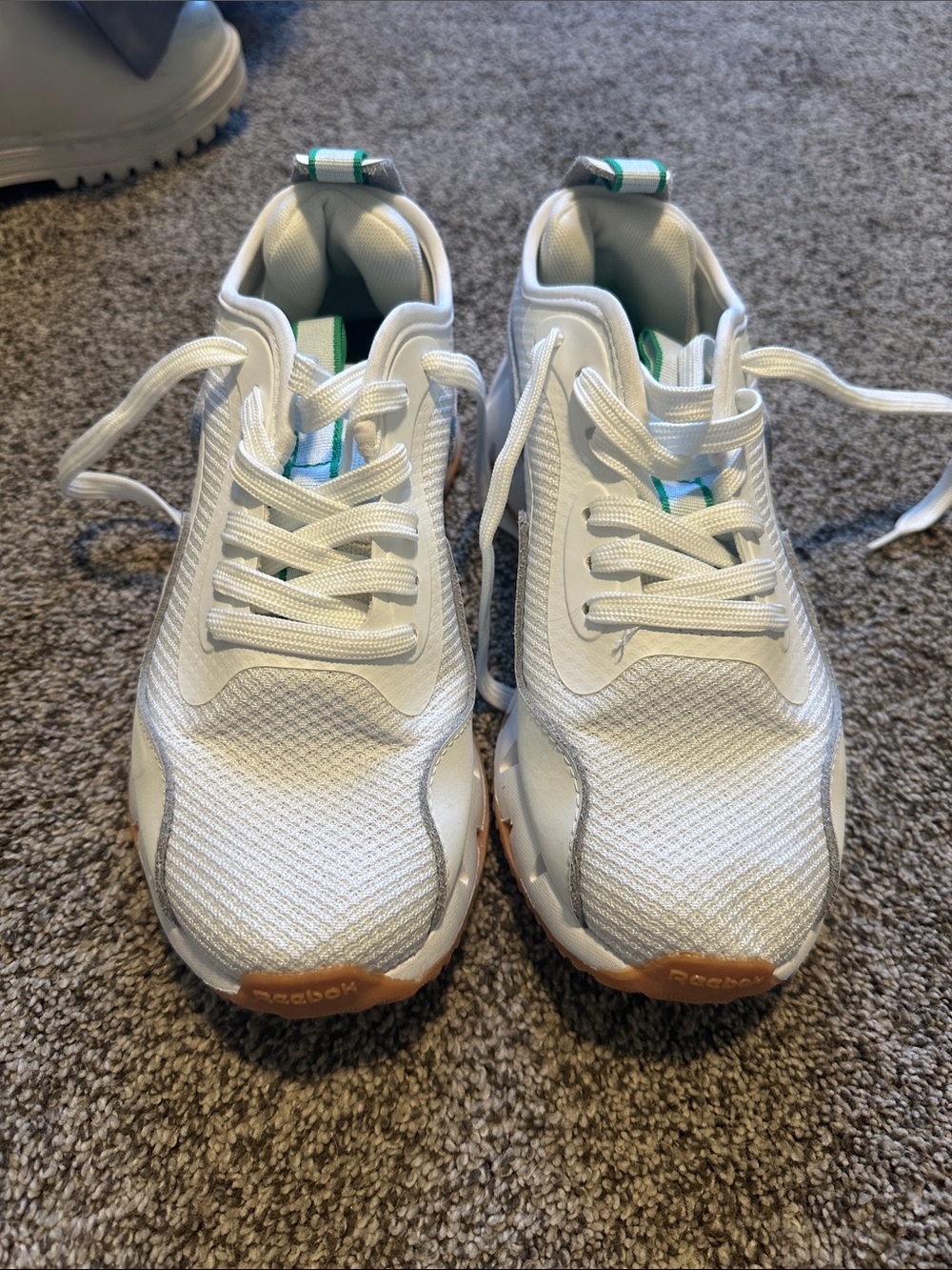 Reebok Women’s White Sneakers with Gum Outsole and Teal Accents